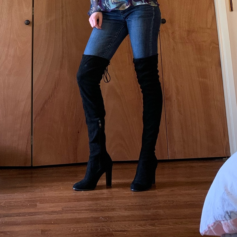 Thigh high black boots